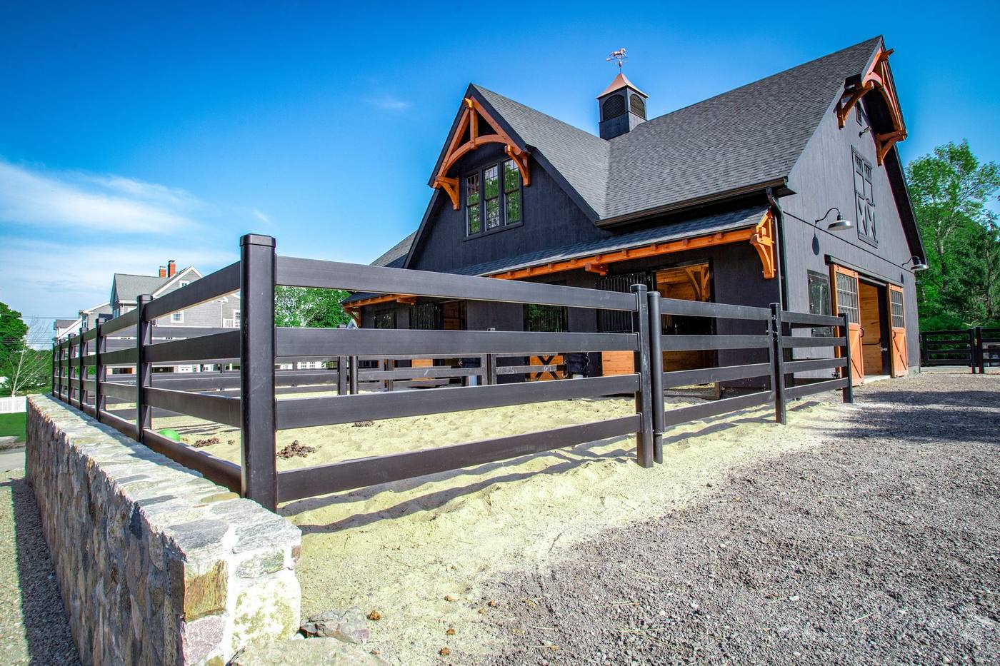 Buckley Fence alongside a barn
